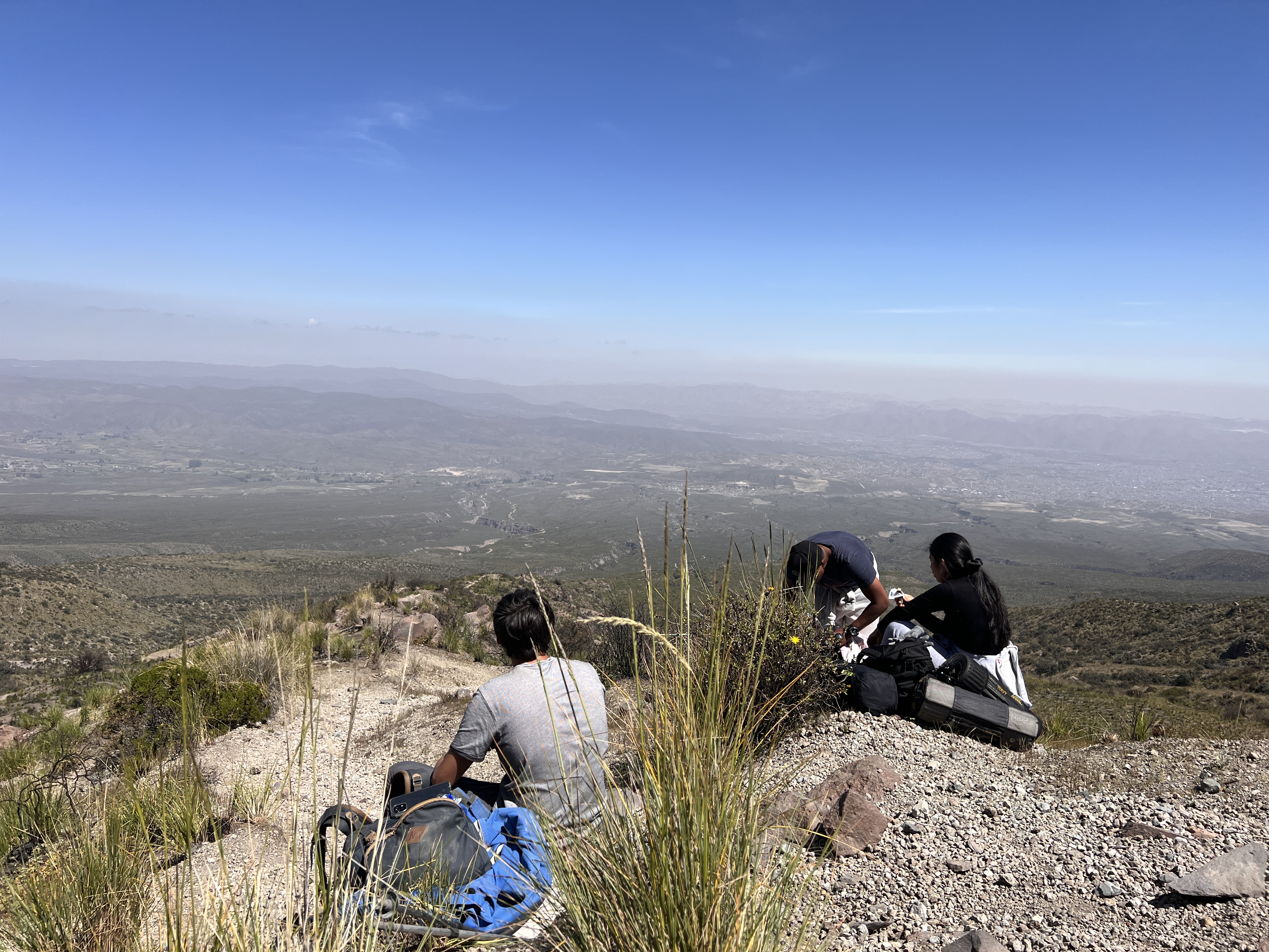 Taking a break on the rocks on our during our climb volcano misti.