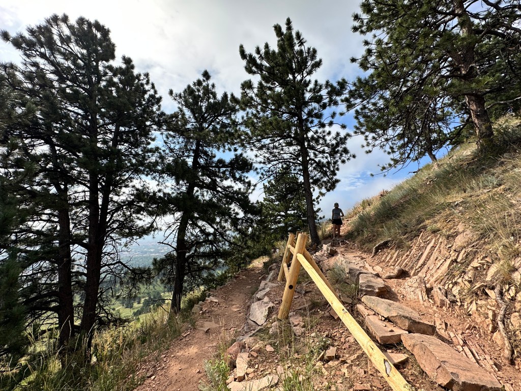 The Dakota Ridge Trail zigzagging back and forth along the backside of Mount Sanitas