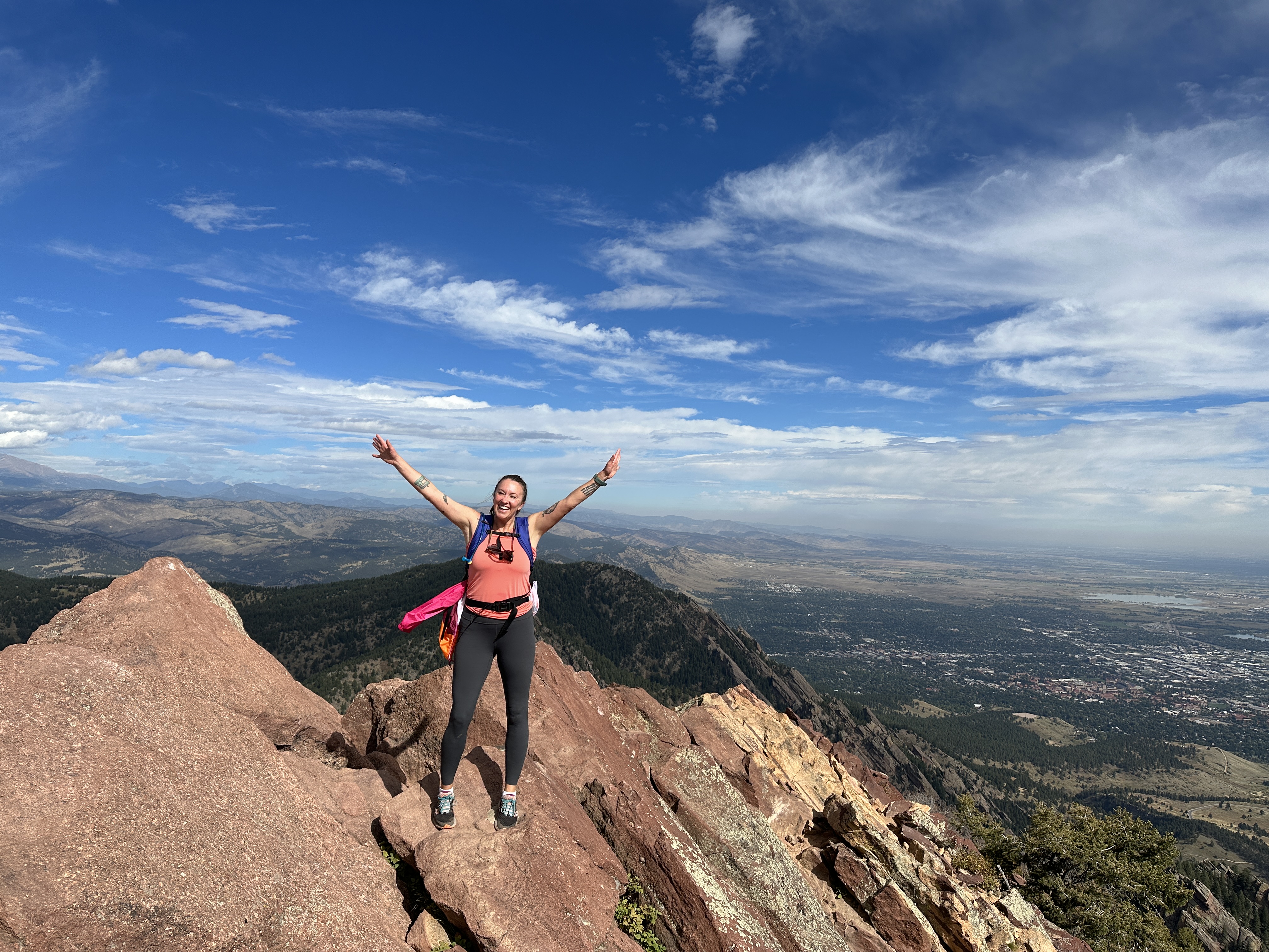 Nicki stands atop the peak of Bear Peak, which is an excellent hike near Boulder.