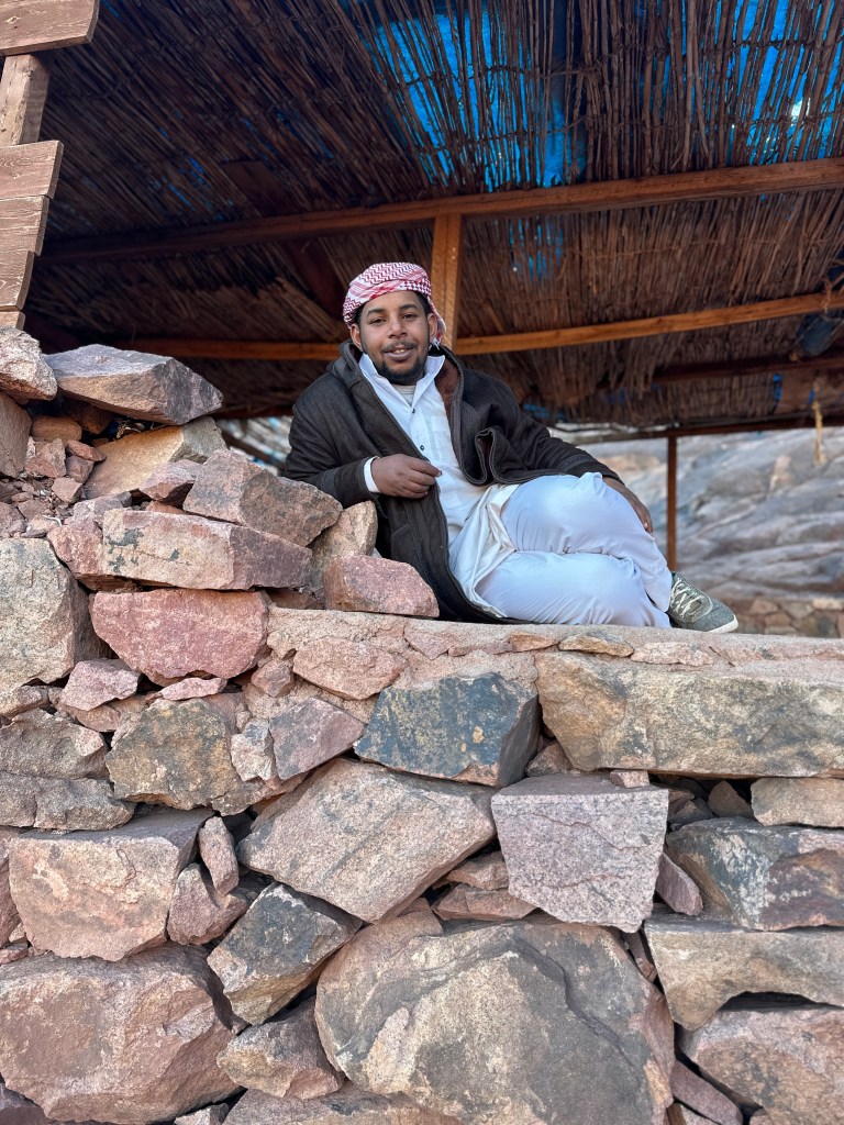 Our guide, Zakariah, takes a break on the hike back down Mt Sinai.