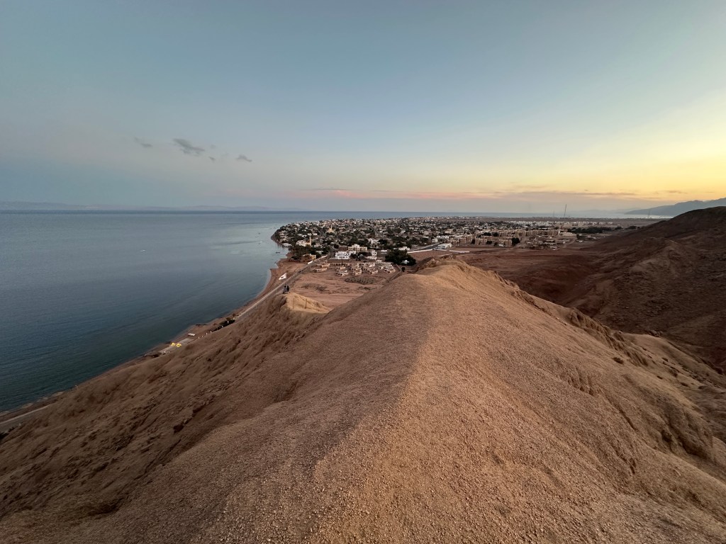 know before going to egypt: It is a safe country and I always felt secure. This is a photo of the sunset on top of a cliff in Dahab.