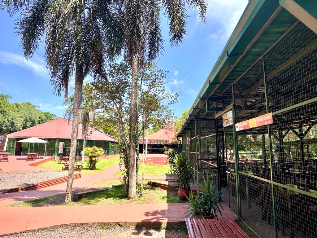 Many picnic tables you can sit at to eat your lunch and restaurants during an Iguazu Falls Trip