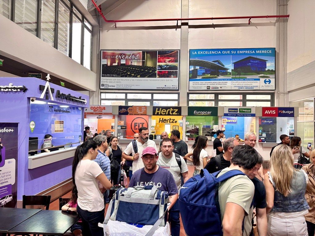 A very busy airport full of people in san miguel de tucuman